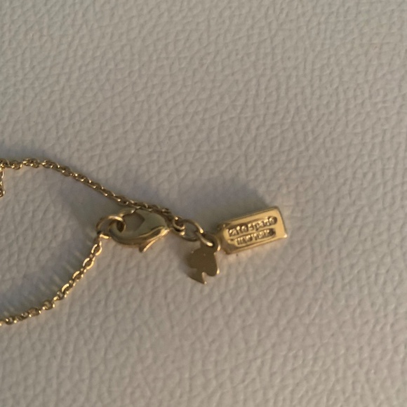 Kate Spade Long Gold Tone Chain with Flower and Oval Stone Accents - Picture 4 of 6